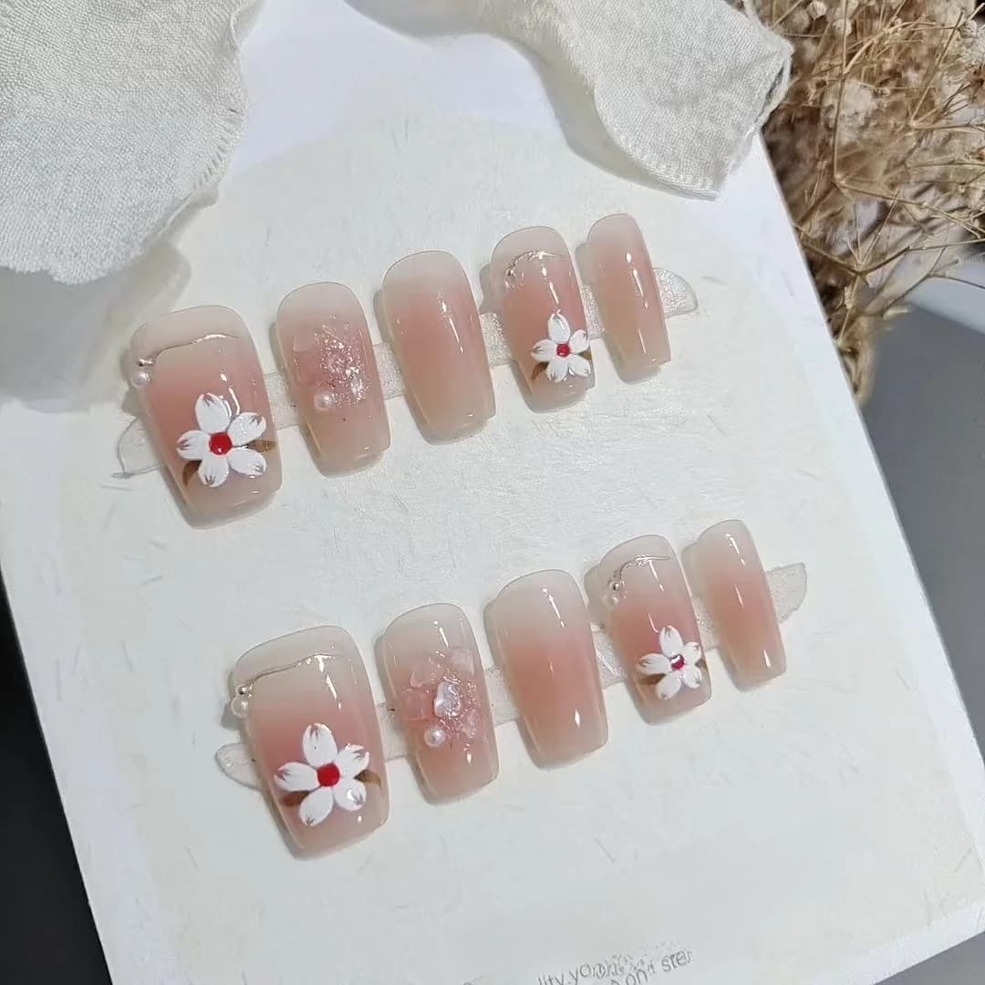 Krátké nalepovací nehty ve tvaru rakve, květinový design magnólie, světle růžová