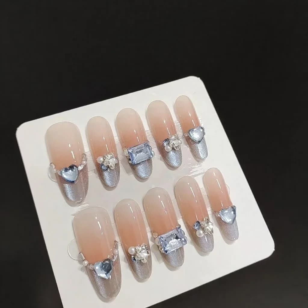 Modré jantarové nalepovací nehty Cat Eye French Tip s kamínky, dlouhý ovál